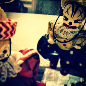 Two ultra creepy old toy clown dolls at my great grandparents house.