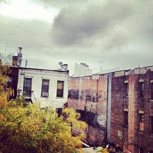 Cloudy sky, empty alley.