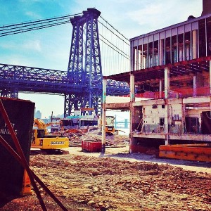 Brooklyn, Manhattan, and Williamsburg bridges seen from the construction site at the old Domino sugar refinery.