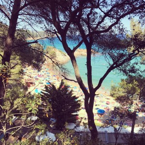 Relaxing on a beautiful beach near Blanes, Spain